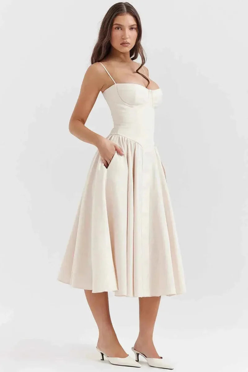 Midi dress with corset top, spaghetti straps, and flared skirt