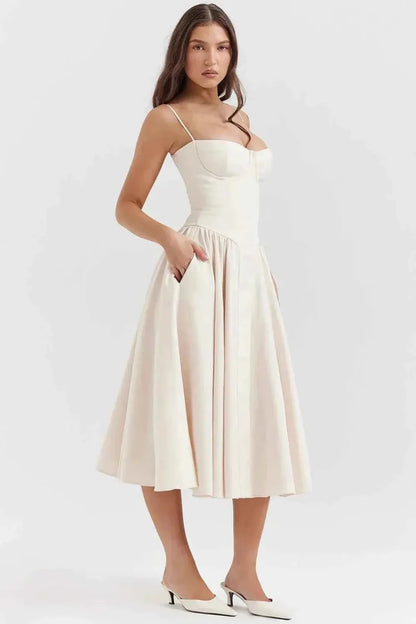 Midi dress with corset top, spaghetti straps, and flared skirt