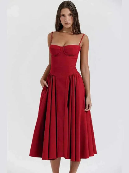 Midi dress with corset top, spaghetti straps, and flared skirt