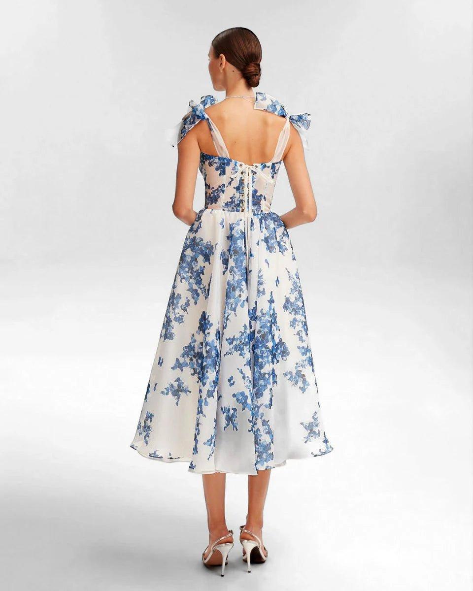 Romantic Midi Dress with Floral Embroidery and Bow Details
