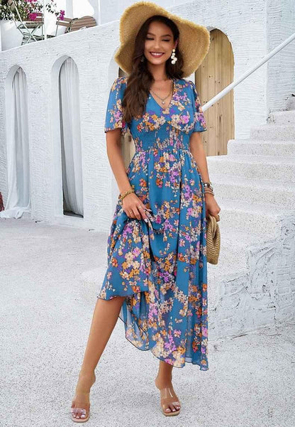 Boho maxi dress with floral print, V-neckline, and smocked waist