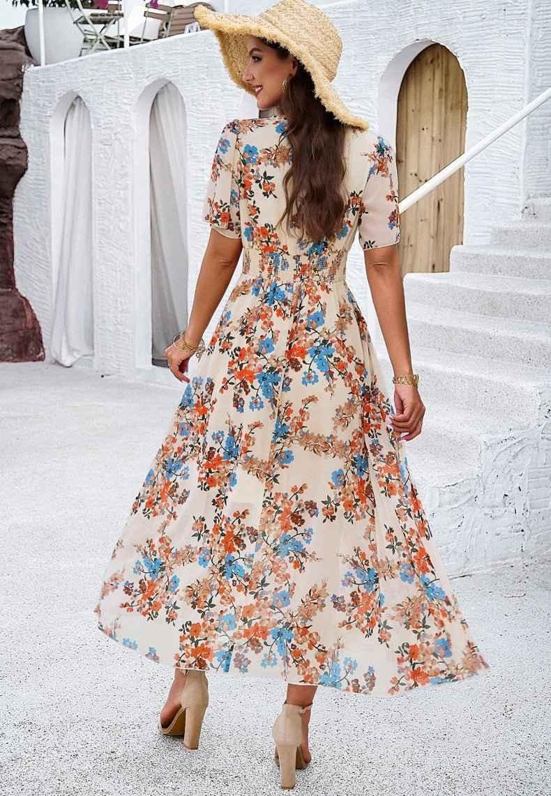 Boho maxi dress with floral print, V-neckline, and smocked waist