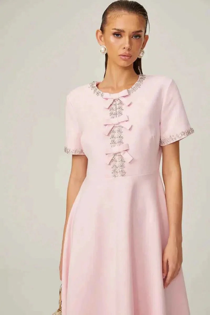 Midi dress with rhinestone details & bow trim