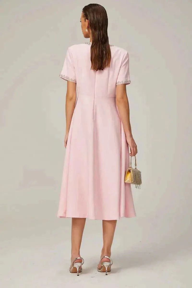 Midi dress with rhinestone details & bow trim