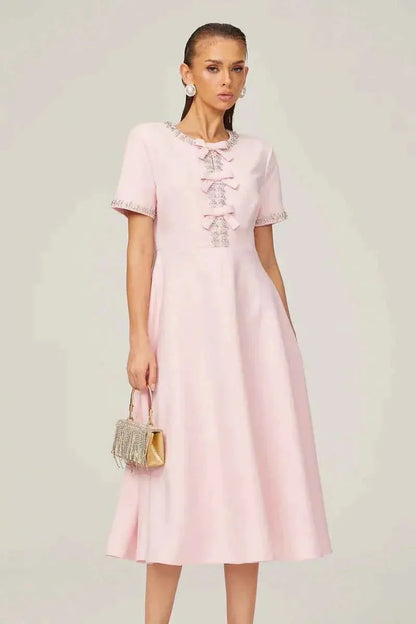 Midi dress with rhinestone details & bow trim